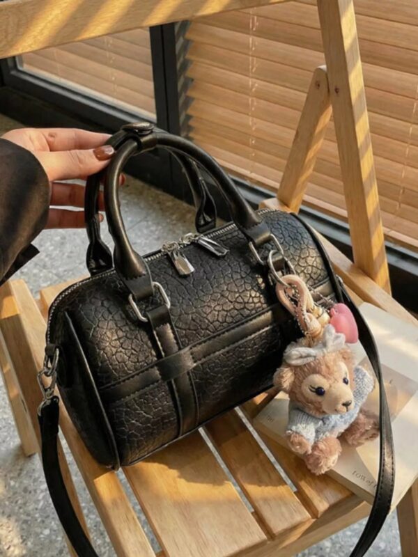 0aee9d5a-56c1-4b50-98ce-8f9cda9b7159-Max-Origin.jpg Textured Barrel Crossbody Bag