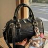 6279c0fd-40ea-4f08-8ec0-b7876450ac45-Max-Origin.jpg Textured Barrel Crossbody Bag